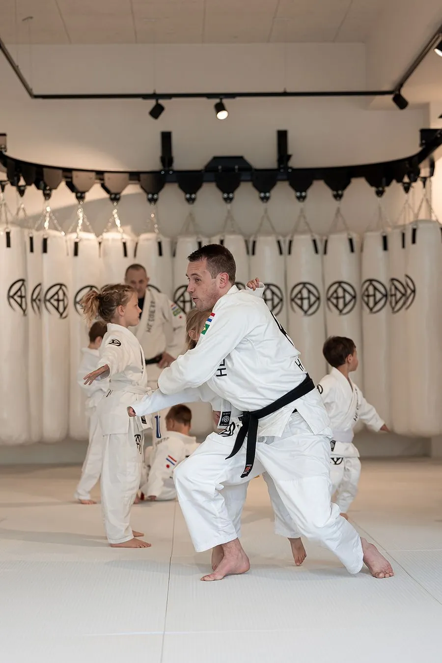 De-Ashi-Barai: Uitdagende Timing, Judo Techniek 2 Judoka oefent een voetveeg tijdens de judotraining in Ede